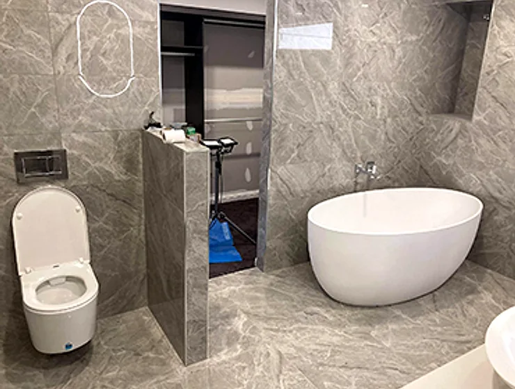 Modern bathroom renovation with freestanding bath completed by Northern Plumbing