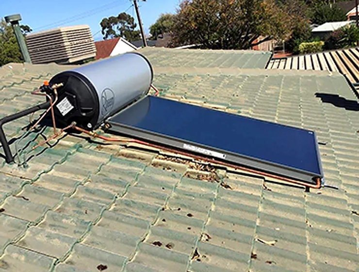 Solar hot water system installed on a tiled roof in Adelaide